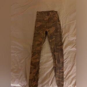 Tan camouflage lululemon leggings in size 2.